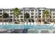 Resort-style pool area with lush landscaping, lounge seating, and shaded cabanas for ultimate relaxation at 235 Fins Up Circle # 1-102, Myrtle Beach, SC 29572