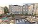 Inviting pool area with lounge chairs, umbrellas, and cozy cabanas perfect for relaxation and enjoyment at 235 Fins Up Circle # 1-102, Myrtle Beach, SC 29572