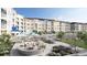 An exterior shot of the outdoor common area with a fire pit and many lounge chairs at 235 Fins Up Circle # 1-104, Myrtle Beach, SC 29572