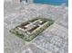 Aerial view of a new apartment complex featuring a central pool and extensive parking at 235 Fins Up Circle # 1-305, Myrtle Beach, SC 29572