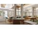 Bright restaurant and bar area with seating and high-end finishes at 235 Fins Up Circle # 1-305, Myrtle Beach, SC 29572