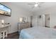 Comfortable bedroom with wood floors, bright walls, and comfortable bed at 2438 Polaris Path, Myrtle Beach, SC 29577