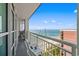 Balcony view of ocean, beach, and neighboring building, perfect for enjoying the coastal breeze at 2504 N Ocean Blvd. # 1936, Myrtle Beach, SC 29577
