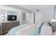 Bright bedroom with a comfortable queen bed, a dresser with a TV, and plenty of closet space at 2504 N Ocean Blvd. # 1936, Myrtle Beach, SC 29577