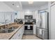 Bright kitchen with stainless steel appliances, granite countertops, and ample cabinet space at 2504 N Ocean Blvd. # 1936, Myrtle Beach, SC 29577