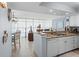 Open-concept kitchen with granite countertops and seamlessly connects to dining and living spaces at 2504 N Ocean Blvd. # 1936, Myrtle Beach, SC 29577
