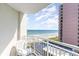 Relaxing balcony view showcasing oceanfront scenery, white railings, and a cozy seating area, perfect for enjoying the coastal breeze at 2504 N Ocean Blvd. # 936, Myrtle Beach, SC 29577