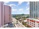 Wide city view showcasing multiple high-rise buildings, a busy street with cars, and lush greenery, offering a dynamic urban setting at 2504 N Ocean Blvd. # 936, Myrtle Beach, SC 29577