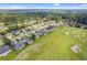 Residential aerial view showcasing a golf course, pond, and peaceful surroundings at 2783 Sanctuary Blvd., Conway, SC 29526
