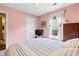 Cozy bedroom with striped bedding, white curtains, and ample natural light at 2783 Sanctuary Blvd., Conway, SC 29526