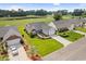 Well-maintained homes featuring attached garages, manicured lawns, and established landscaping at 2783 Sanctuary Blvd., Conway, SC 29526