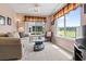 Inviting living room with plush seating, golf course views, and neutral tones at 2783 Sanctuary Blvd., Conway, SC 29526
