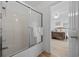 Bright bathroom featuring a shower over tub combination and a view into the bedroom at 304 62Nd Ave N 62Nd Ave. N, North Myrtle Beach, SC 29582