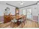 Dining room features a wooden table and seating for six near a glass door at 304 62Nd Ave N 62Nd Ave. N, North Myrtle Beach, SC 29582