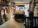 Garage featuring a golf cart and shelving for storage, adding functionality and convenience at 304 62Nd Ave N 62Nd Ave. N, North Myrtle Beach, SC 29582
