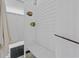 Outdoor shower stall with decorative fish, offering a refreshing and convenient post-beach rinse at 304 62Nd Ave N 62Nd Ave. N, North Myrtle Beach, SC 29582