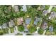 Aerial view showcasing the home nestled among mature trees in a peaceful neighborhood at 3537 Lighthouse Way, Myrtle Beach, SC 29577