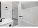 Bright bathroom featuring white vanity and white shower/tub combination at 3537 Lighthouse Way, Myrtle Beach, SC 29577
