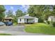 Charming single-story home with nice lawn, driveway, and inviting front entrance at 3537 Lighthouse Way, Myrtle Beach, SC 29577