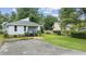 Charming home with a well-kept lawn and driveway, showcasing its curb appeal at 3537 Lighthouse Way, Myrtle Beach, SC 29577