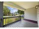 Relaxing covered front porch with a view of the neighborhood and plenty of shade at 3537 Lighthouse Way, Myrtle Beach, SC 29577