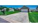 Charming single-story home featuring a two-car garage, well-manicured lawn, and a concrete driveway in a friendly neighborhood at 365 Lenox Dr., Conway, SC 29526