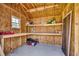 Interior of a storage shed with shelves and lawn equipment at 365 Lenox Dr., Conway, SC 29526