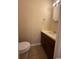 Half bathroom featuring a white vanity and toilet at 403 71St Ave. N # 14, Myrtle Beach, SC 29575