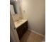Compact bathroom with a sleek vanity and neutral tile flooring at 403 71St Ave. N # 14, Myrtle Beach, SC 29575