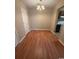 Open dining room with hardwood floors and a view into the kitchen at 403 71St Ave. N # 14, Myrtle Beach, SC 29575