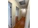 Hallway featuring attractive wood-look flooring that connects various rooms at 403 71St Ave. N # 14, Myrtle Beach, SC 29575