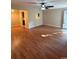 Bright living room featuring hardwood floors and a ceiling fan at 403 71St Ave. N # 14, Myrtle Beach, SC 29575