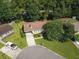 Aerial view of a charming home with a well-manicured lawn and mature trees at 424 Villa Woods Dr., Myrtle Beach, SC 29579