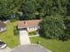 Aerial view of a lovely home with well-kept landscaping and proximity to a pond at 424 Villa Woods Dr., Myrtle Beach, SC 29579