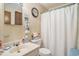 Half bath features a sink, toilet, and wall mirror at 424 Villa Woods Dr., Myrtle Beach, SC 29579