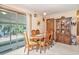 Dining room area features a wood table and backyard patio access at 424 Villa Woods Dr., Myrtle Beach, SC 29579