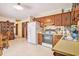 Functional kitchen features classic wood cabinetry and appliances at 424 Villa Woods Dr., Myrtle Beach, SC 29579
