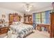 Bedroom features a ceiling fan and an assortment of decorative touches at 424 Villa Woods Dr., Myrtle Beach, SC 29579