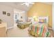 Bright bedroom featuring two twin beds, neutral carpeting and bright color scheme at 431 Huntington Lake Circle # 80, Pawleys Island, SC 29585