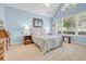 Charming bedroom featuring a vaulted ceiling, large window, and comfortable furnishings at 431 Huntington Lake Circle # 80, Pawleys Island, SC 29585