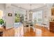 A full shot of the dining room, with a view of the outdoor patio and grill at 431 Huntington Lake Circle # 80, Pawleys Island, SC 29585