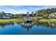 Scenic lake view featuring community gazebo and lush landscaping at 431 Huntington Lake Circle # 80, Pawleys Island, SC 29585