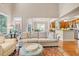Open concept living room with view to the dining room and kitchen at 431 Huntington Lake Circle # 80, Pawleys Island, SC 29585