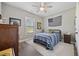 Cozy bedroom with ceiling fan and natural light from window at 4446 Boggy Rd., Conway, SC 29526