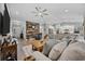 Open-concept living room featuring vaulted ceilings, wood accent wall, and modern furnishings at 4446 Boggy Rd., Conway, SC 29526