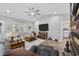 Open concept living room featuring high ceilings, large TV and modern furnishings at 4446 Boggy Rd., Conway, SC 29526