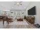 Spacious living area featuring a comfortable sectional sofa and a large flat-screen TV at 4446 Boggy Rd., Conway, SC 29526