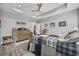 Spacious main bedroom features tray ceiling, ceiling fan, and natural light at 4446 Boggy Rd., Conway, SC 29526