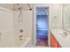 Well-lit bathroom with tub and shower combination featuring neutral walls and bright lighting at 4524 E Walkerton Rd., Myrtle Beach, SC 29579