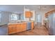 Functional kitchen with stainless steel appliances, wood cabinets, and a seamless flow to other living areas at 4524 E Walkerton Rd., Myrtle Beach, SC 29579